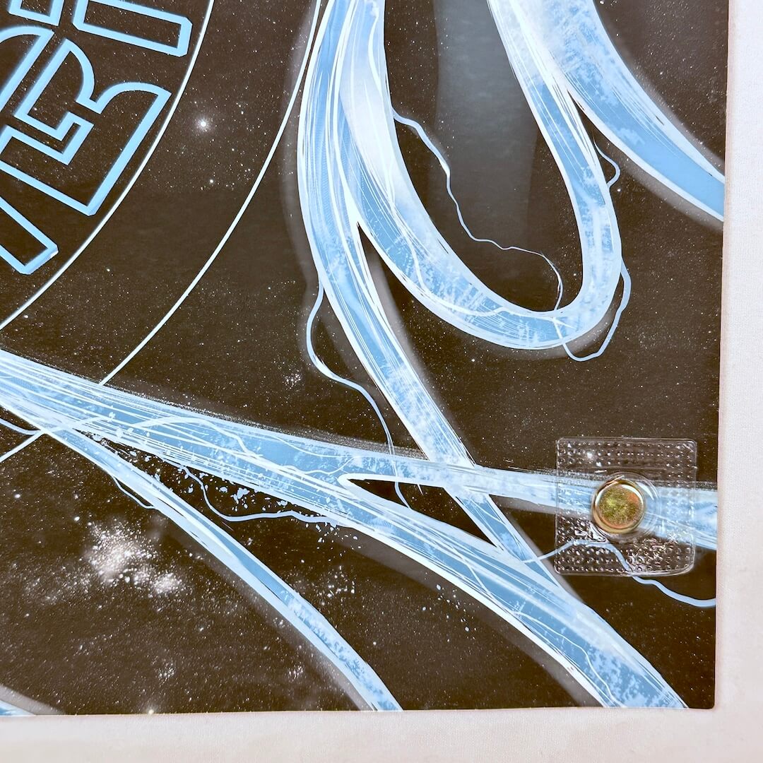 Bottom right corner of poster showing no damage to corner or edges.