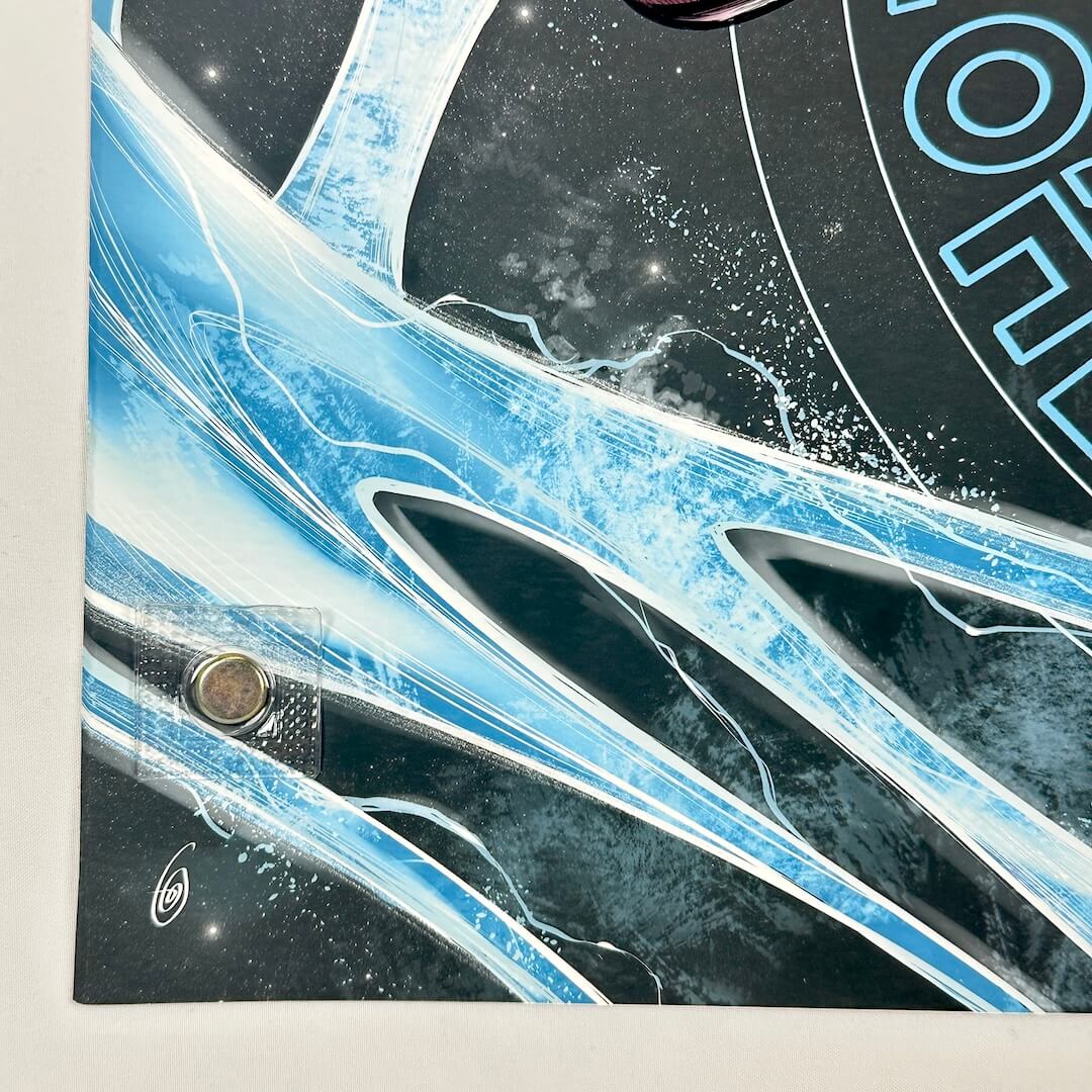 Bottom left corner of poster showing crease along edge that doesn't impede design.