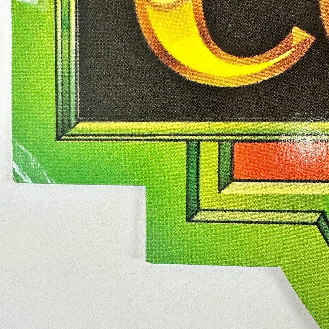 Close up of bottom left section to show curled corner but otherwise excellent edges.