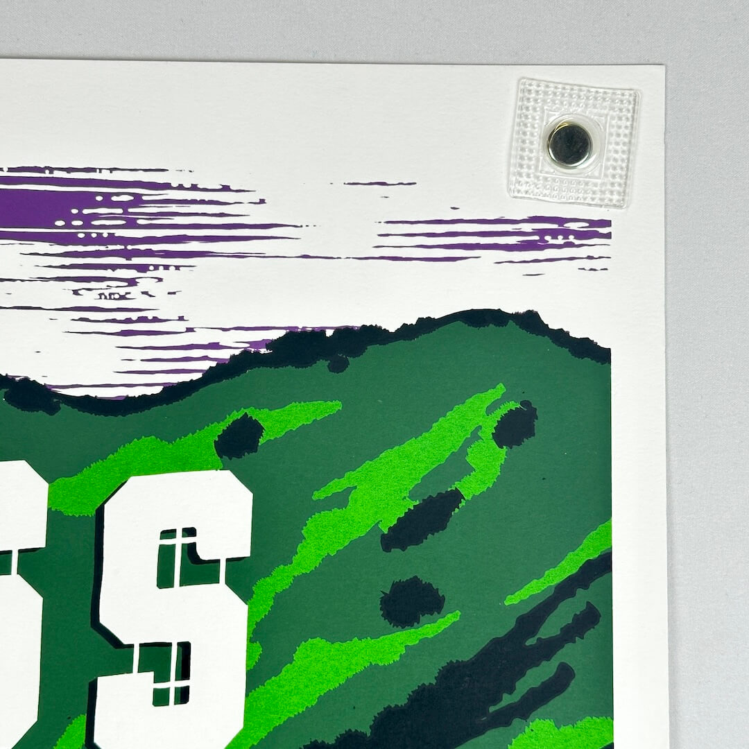 Top right corner of poster showing no damage to corner or edges.