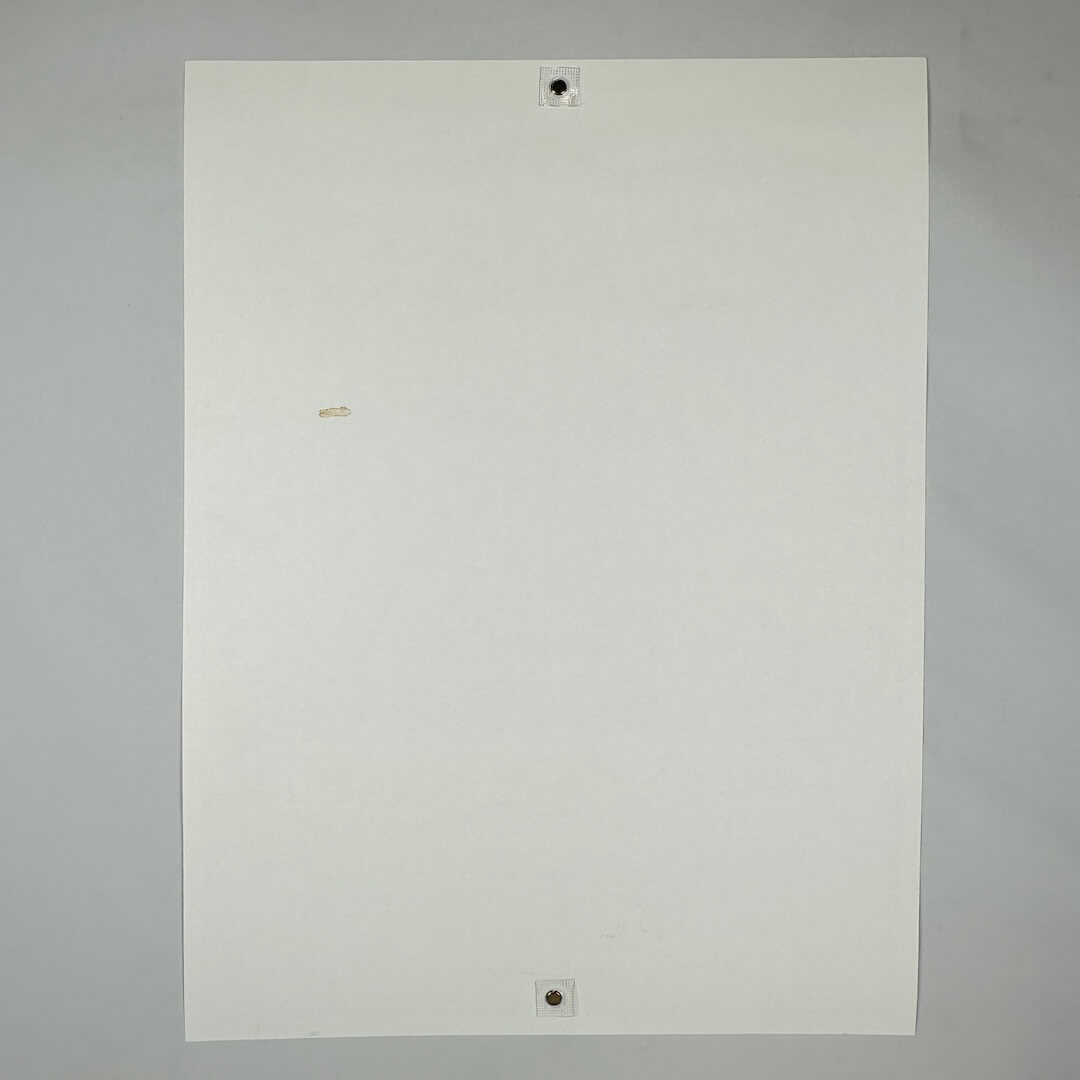 Backside of poster showing spot of damage at left center.