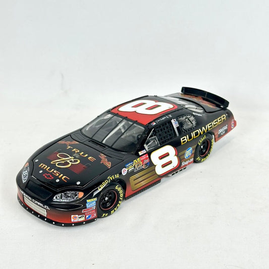 Model car with Budweiser and other sponsor logos on a white background