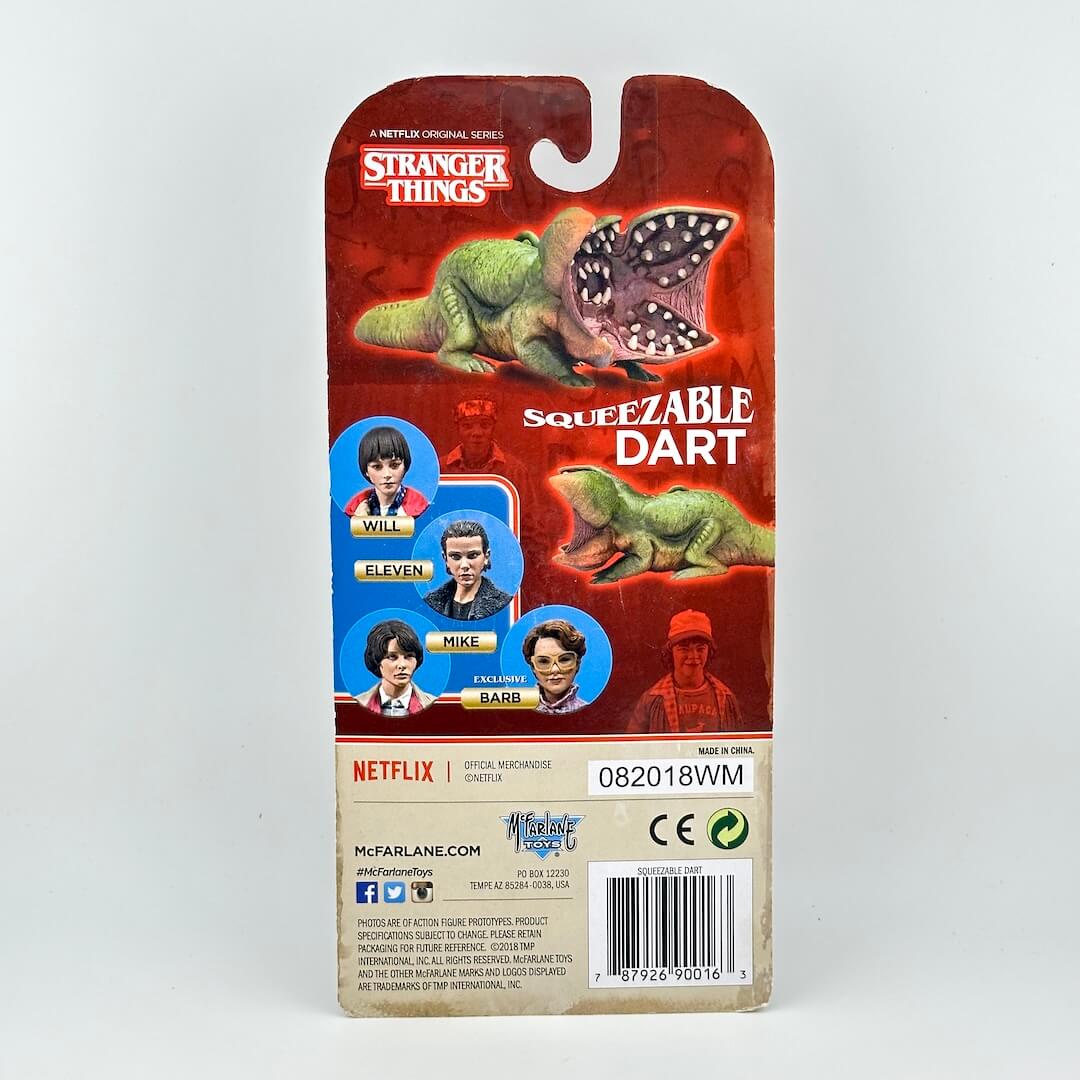 Back of a Stranger Things Squeezable Dart toy package, showing the red card backing with character graphics.