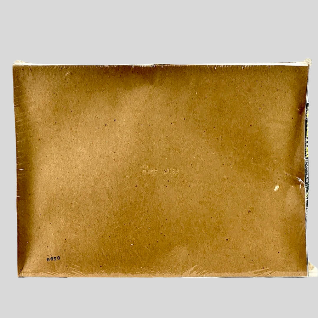 back of plastic wrapped box showing concave nature of box but no other damage visible.