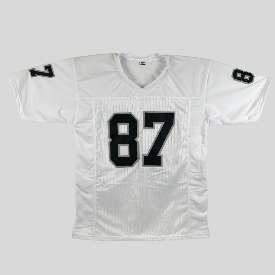 White sports jersey with black number 87 on a gray background