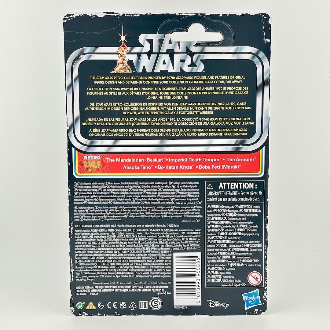 Back of a Star Wars action figure package, showing product details, & descriptions in multiple languages.