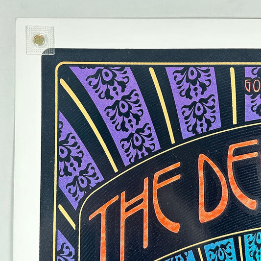 Top left corner of poster with no visible damage.