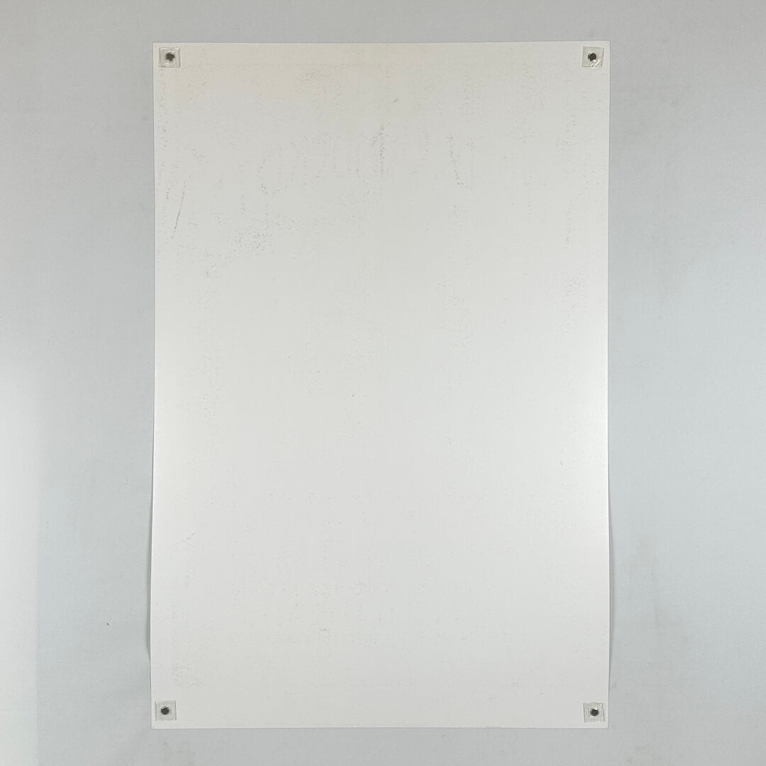 Backside of poster with some black scuffs.