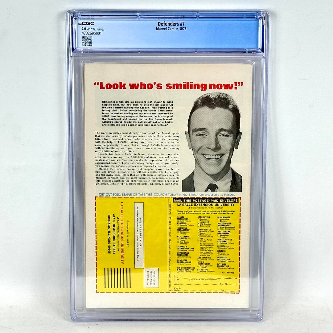 Comic book back cover with a smiling man and text, encased in a protective frame.