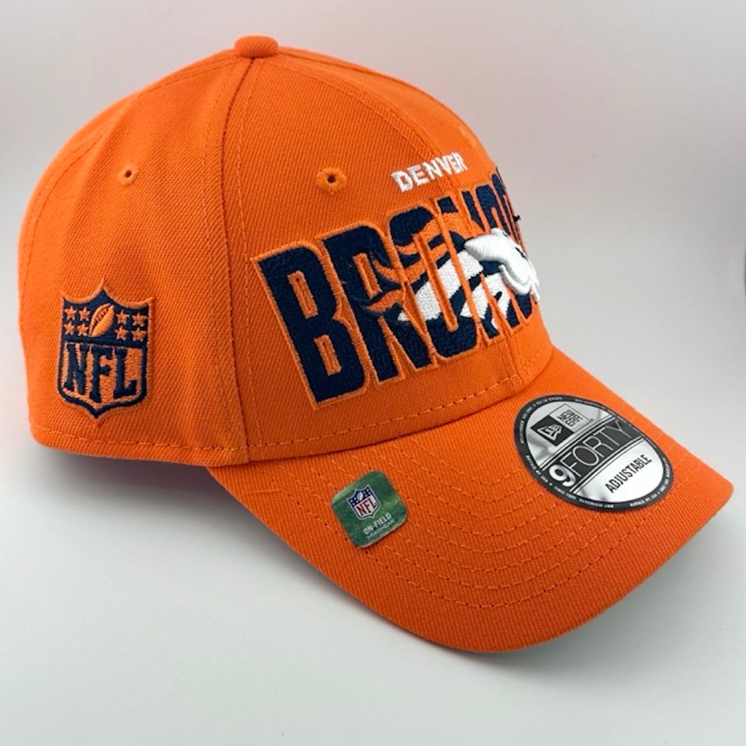Orange snapback cap with Broncos team name & logo embroidered center-face. NFL & New Era logos on either side.