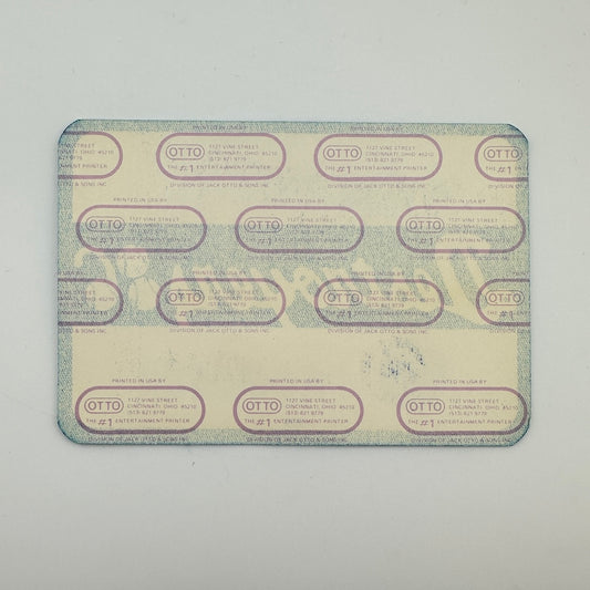 Backside of pass showing intact backing and mint condition.