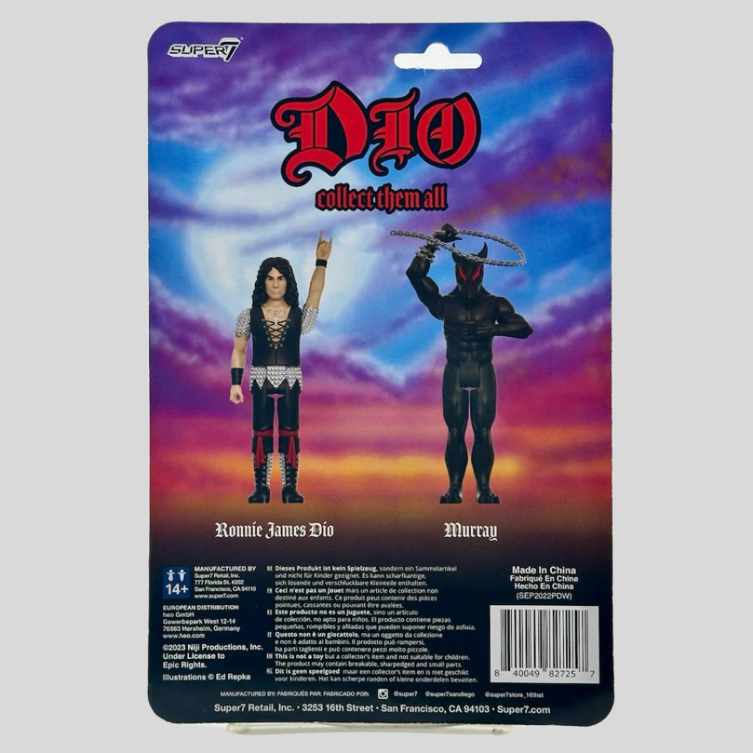 Back of package with images of each action figure option, white text with manufacturing info, cloudy sky & moon in background