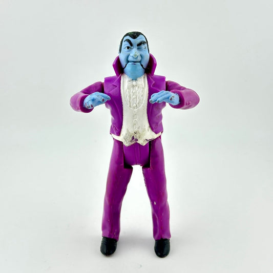 Toy figure of a character in a purple suit on a white background