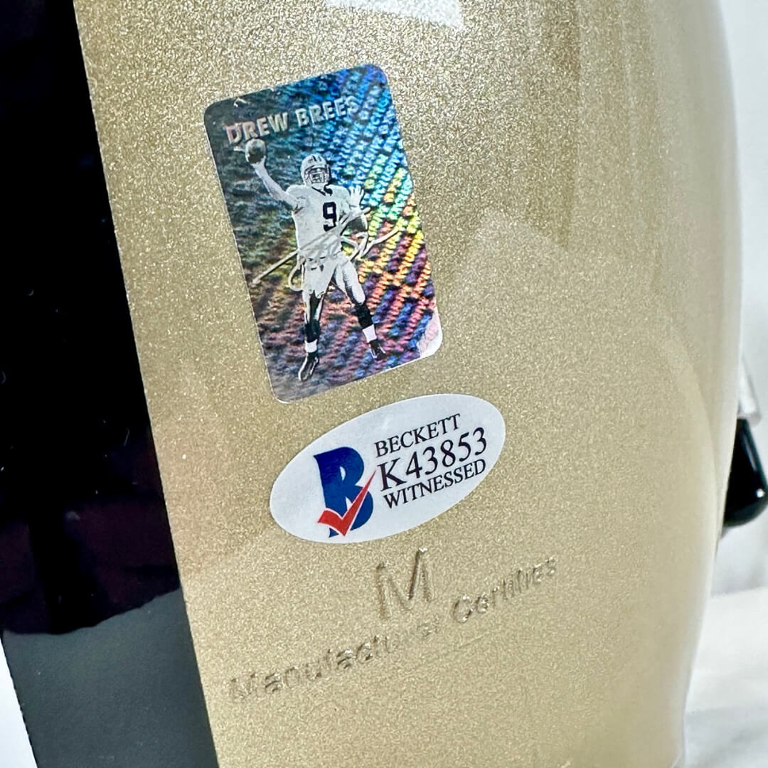 Close up of authentication stickers on back of helmet by manufacturer information.