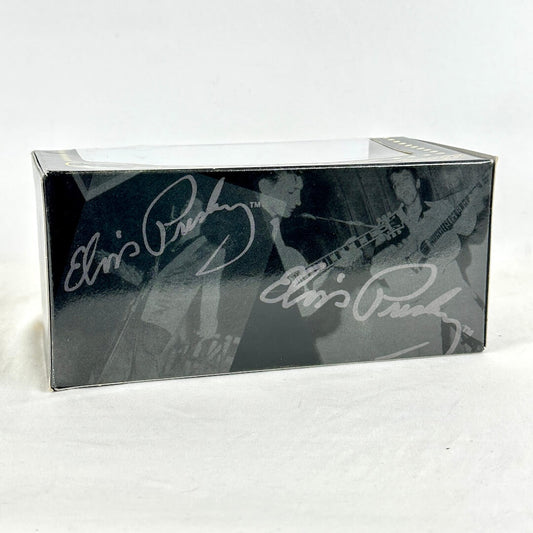 Backside of Matchbox car set with Elvis Presley branding and facsimile signatures.