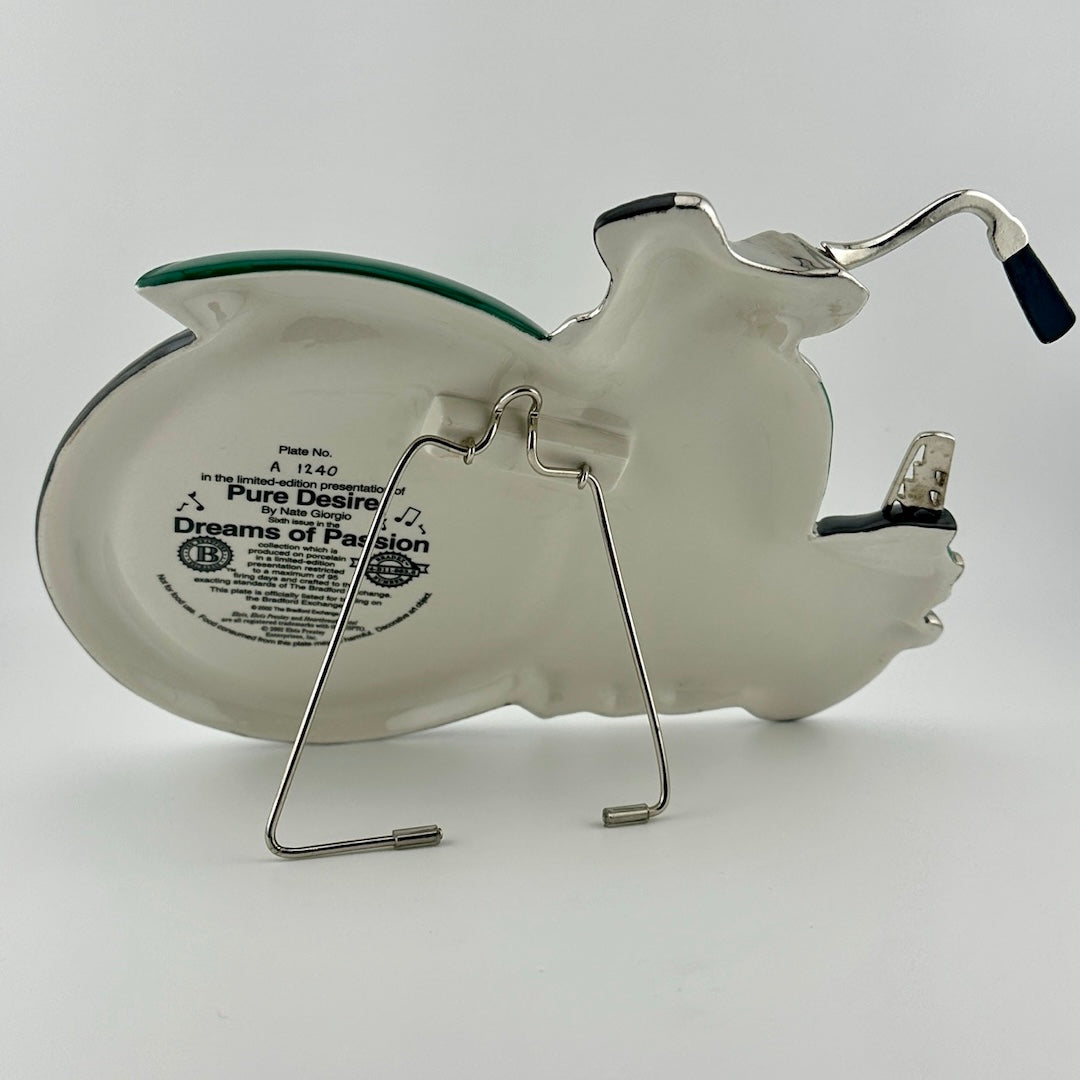 Back of plate to show attached wire stand and plate information on front wheel.