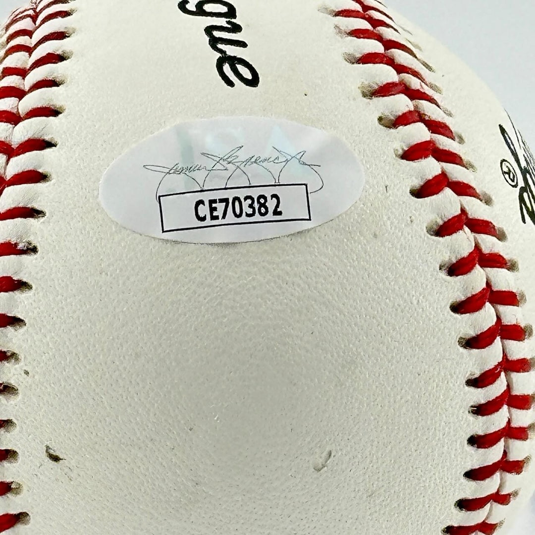 Close up of JSA authentication sticker next to ball information stamp.