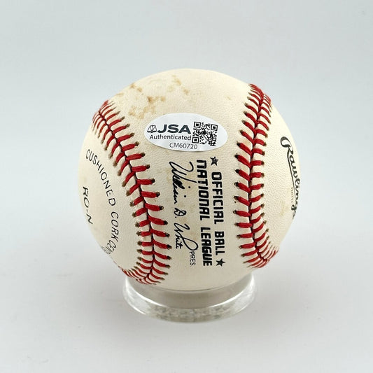 Baseball with JSA authentication label on a white background