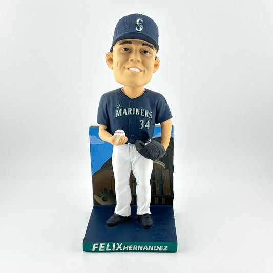 Bobblehead figure of a baseball player in a Mariners uniform on a white background