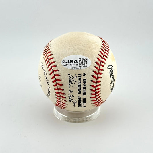 Baseball with JSA Authentication label on a white background