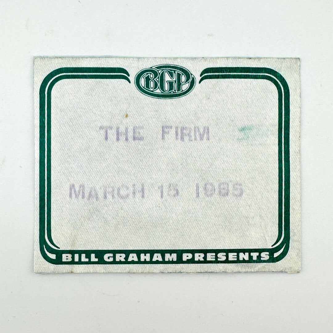 Vintage concert ticket stub with 'BCP' logo, with stamped event info on a white background