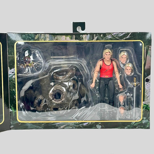 Action figure in packaging with accessories on a white background