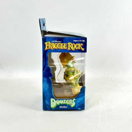 Small toy figure in blue and green box with "Fraggle Rock" branding against white background.