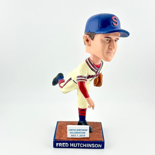 Bobblehead figure of a baseball player in a blue and red uniform with a white background
