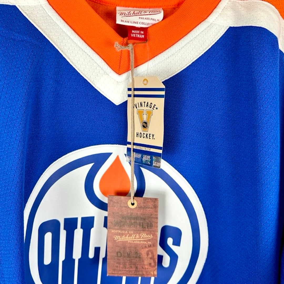 Image of original Mitchell & Ness sales tags & Vintage Hockey official license tag.