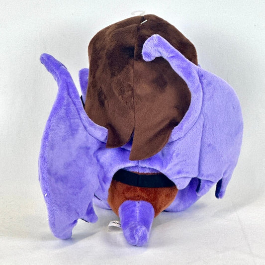 Backside of purple plush toy with wings.