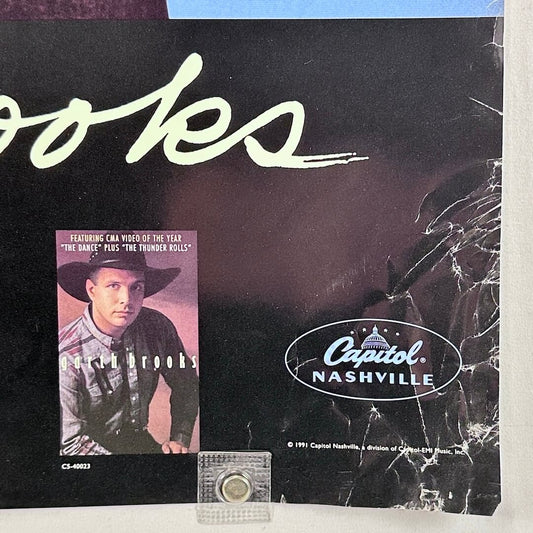 Record cover with a portrait of a person wearing a cowboy hat and the Capitol Nashville logo.