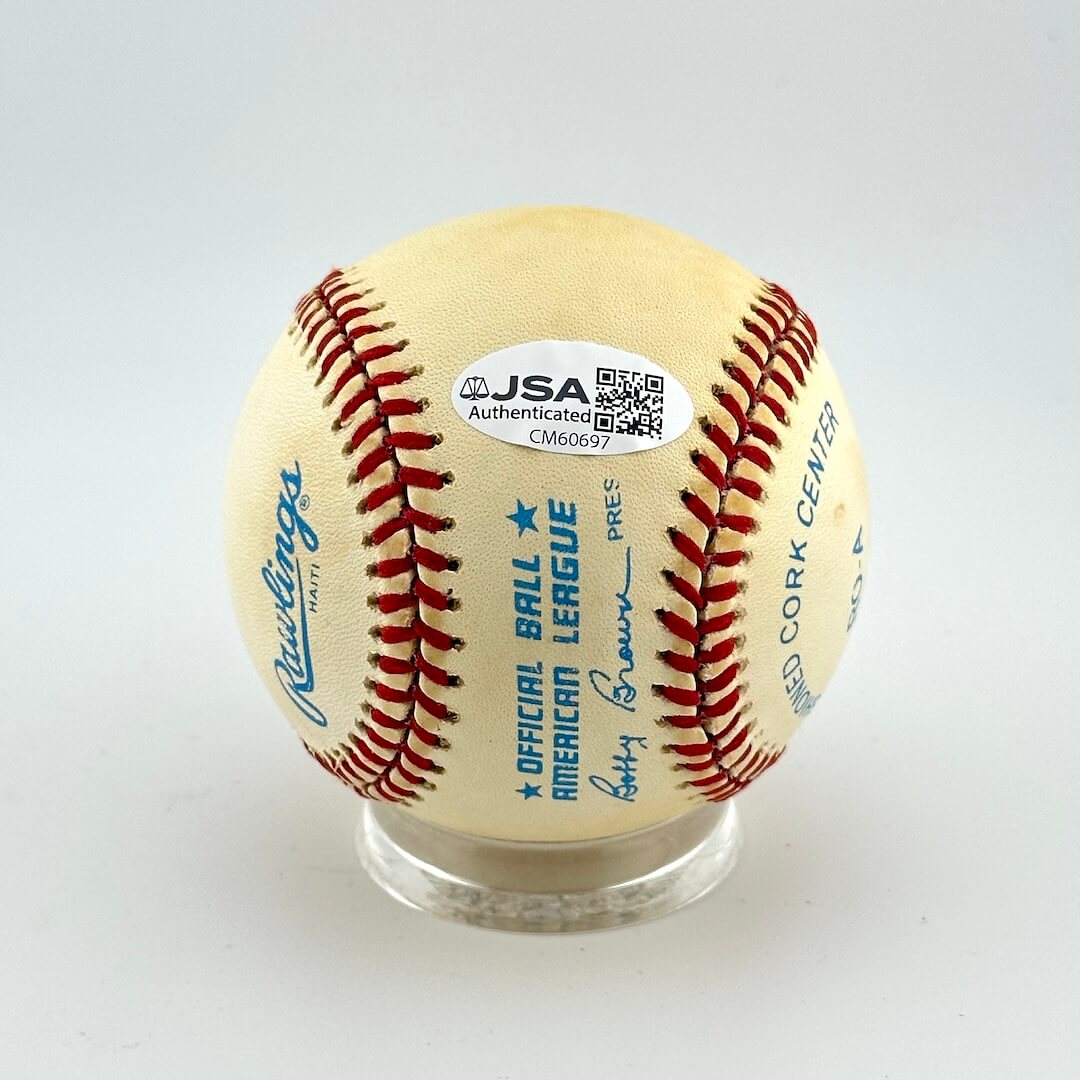Baseball with stitching and text on a white background