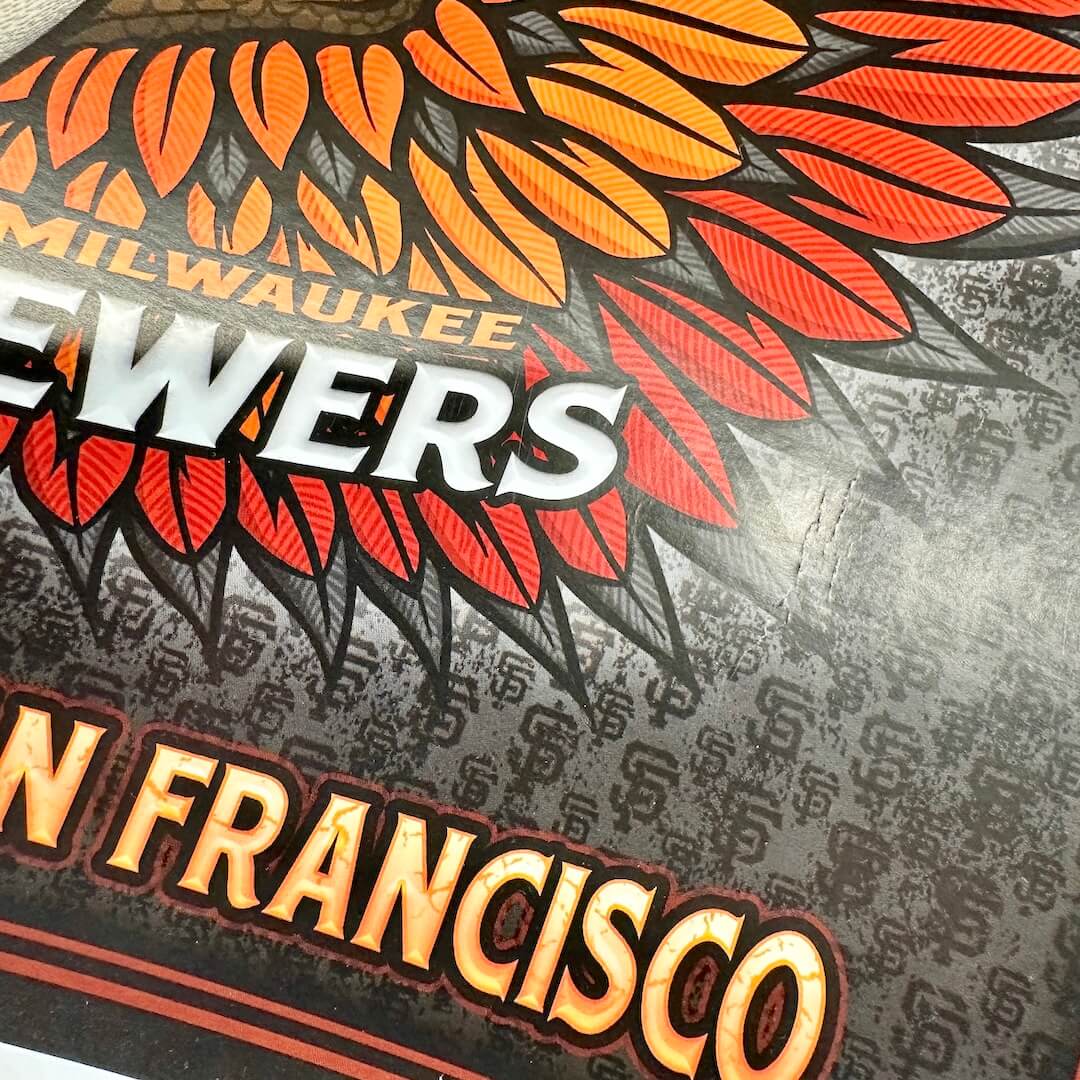Image close up of crease in right side of poster face.