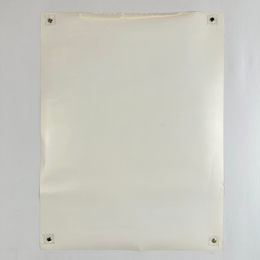 Backside of poster showing no damage to face and wear to edges.