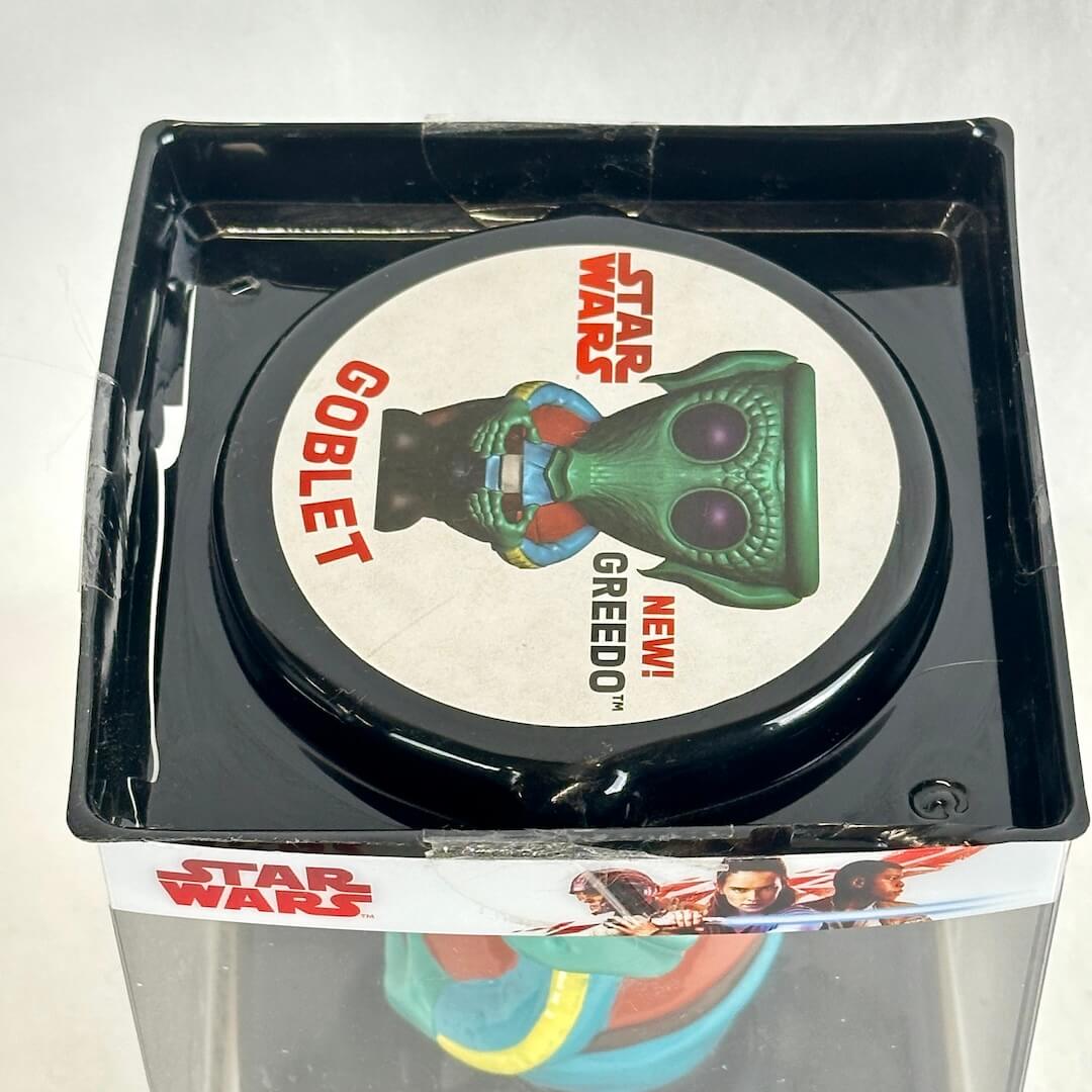 Top of packaging showing cracks and imperfections.