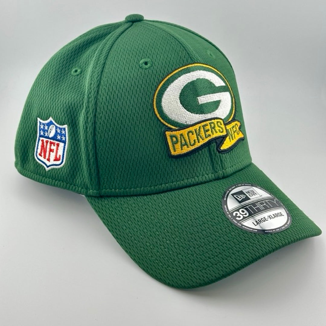 Green snapback cap with Packers team name, NFC & logo embroidered center-face. NFL & New Era logos on either side.