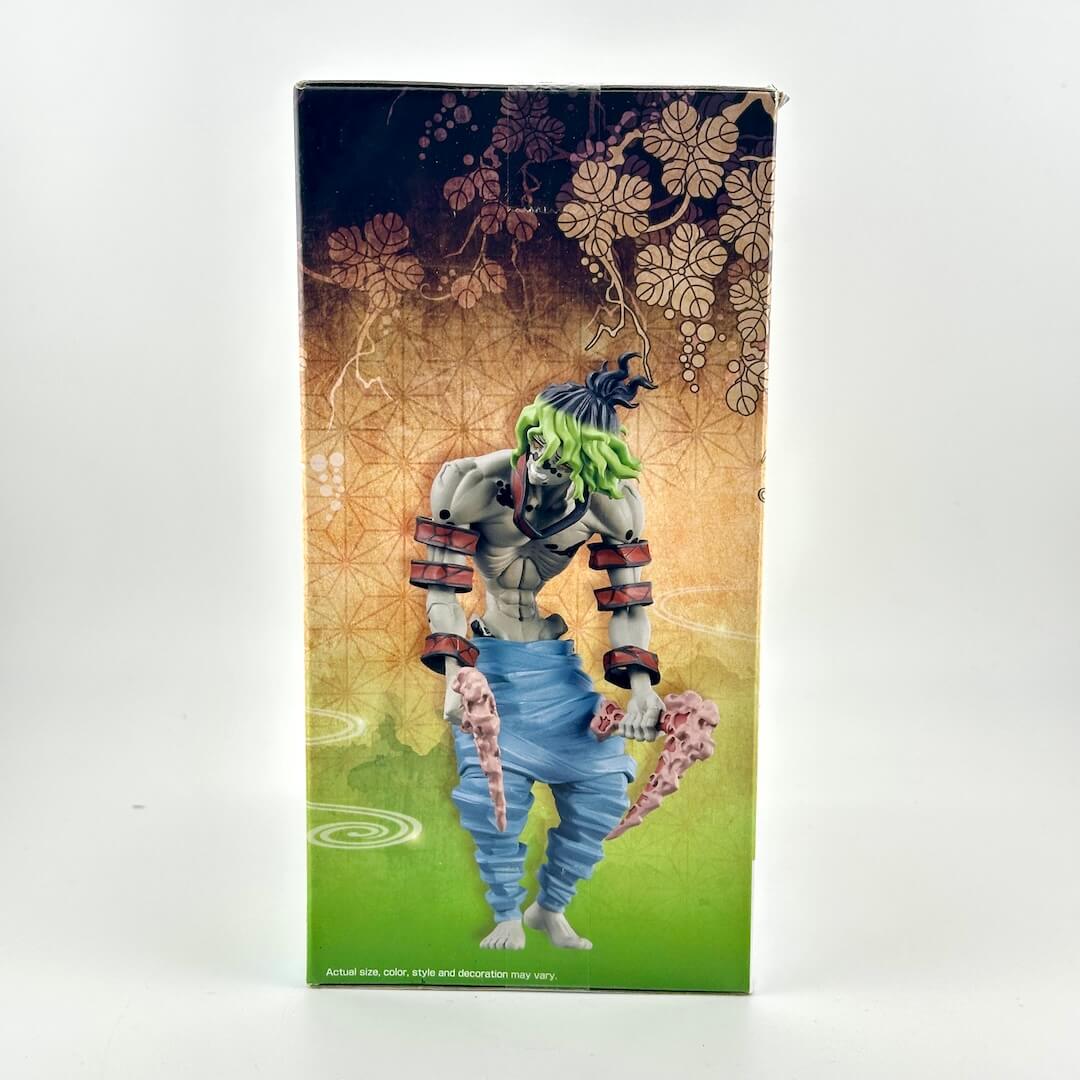 Side view of packaging for figure showing illustration of character on a floral background.