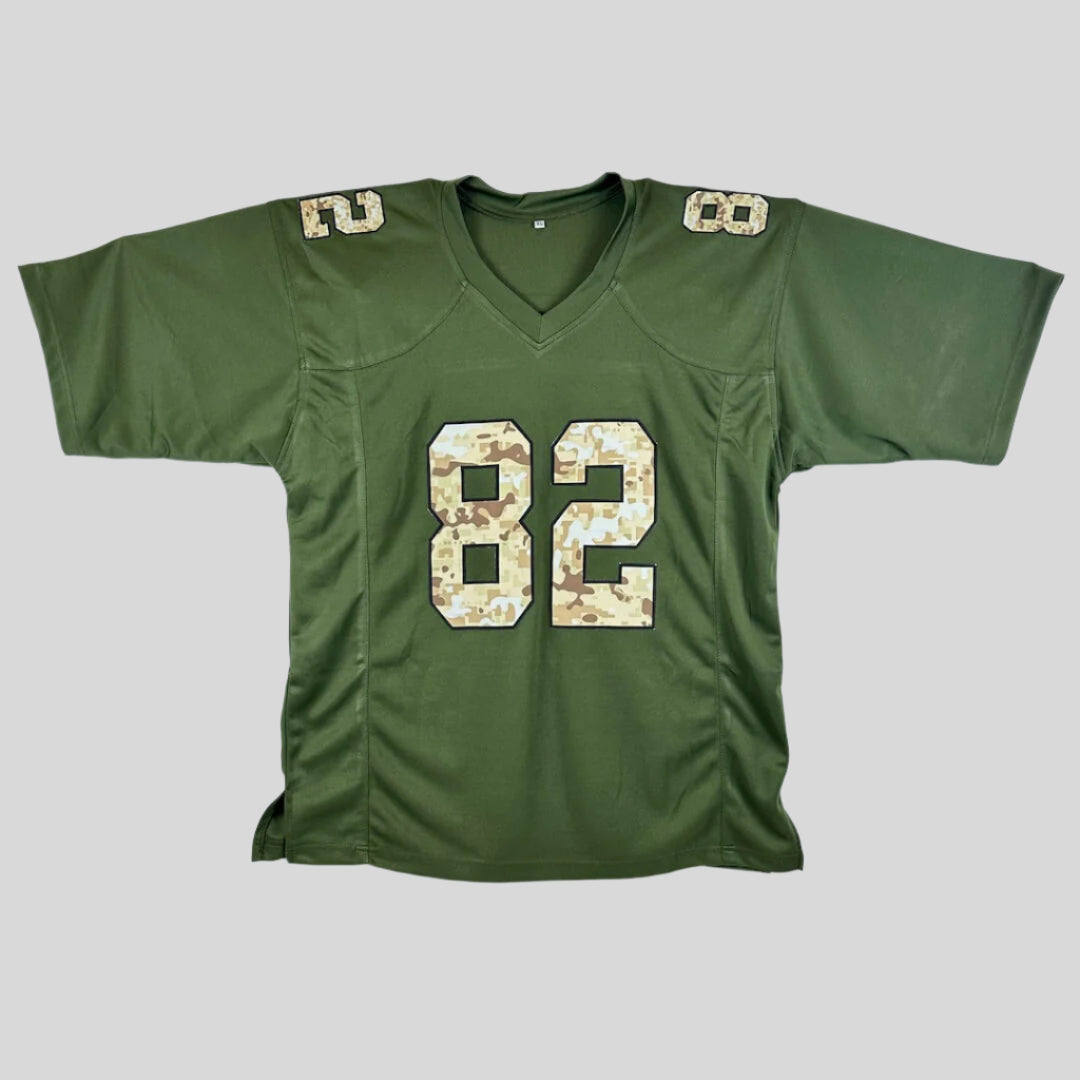 Green sports jersey with camouflage number 82 on a white background