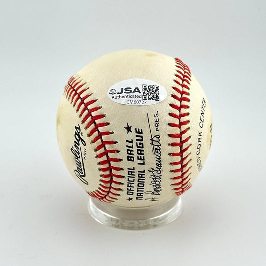 Baseball with Rawlings logo and JSA authentication label on a white background