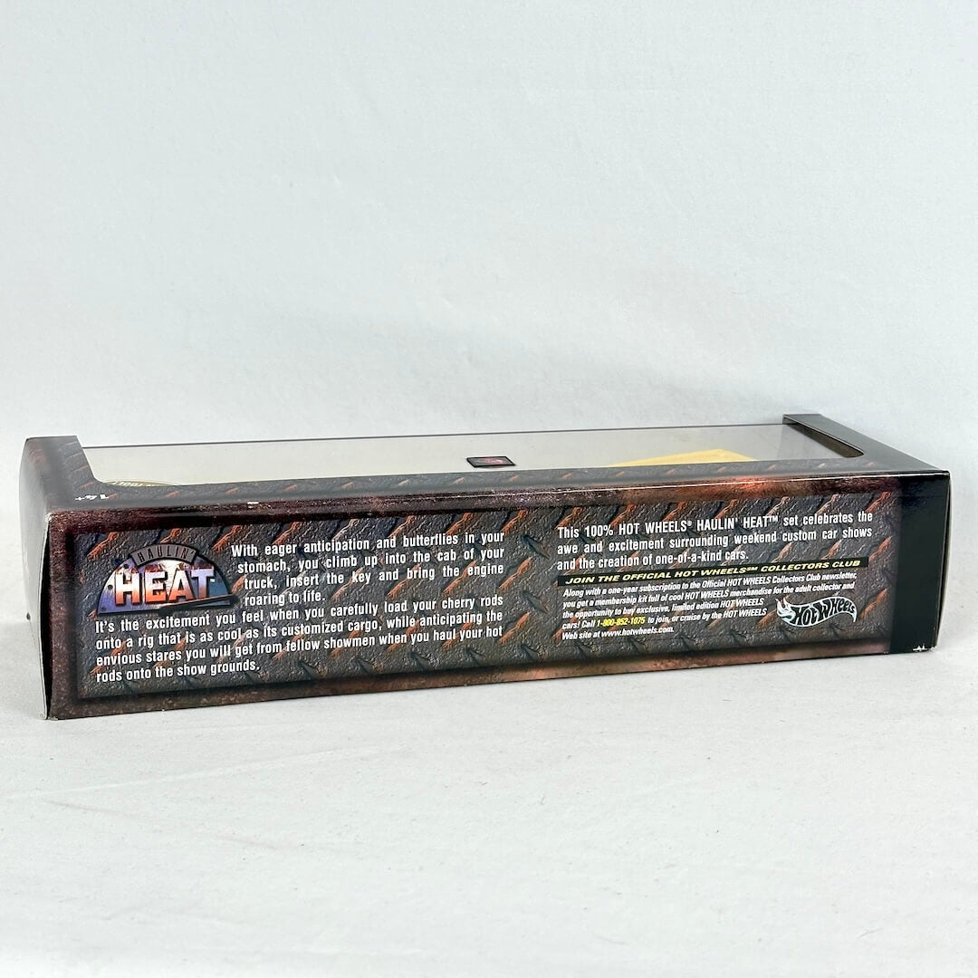 The back of a Hot Wheels product box, showing extensive product information, photographed on a light gray background.