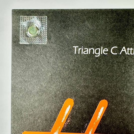 Top left corner of poster with clean edges and crisp corner.