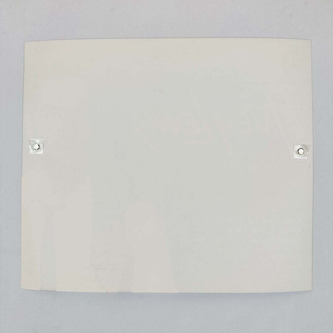 Backside of white poster against white background.