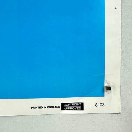 Corner of a blue print with 'Printed in England' and 'Copyright Approved' labels.