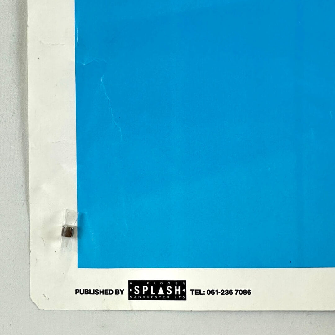 Blue poster with 'Splash' logo and contact information on a gray background