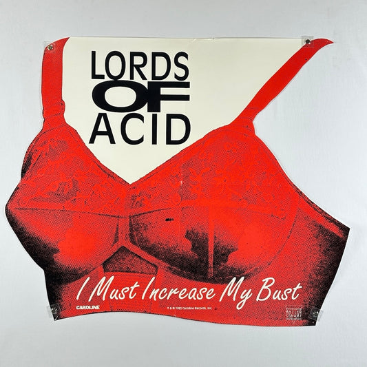 "Lords of Acid" in black text above red vintage brassiere image.