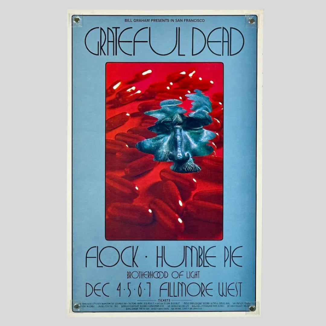 Blue poster with red rectangular center with red pills as background to blue floating face, event info printed at top & bottom.