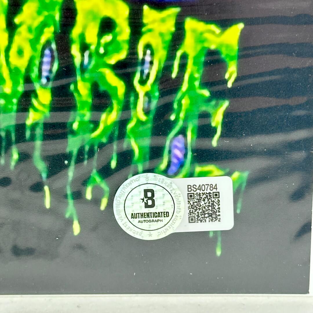 Close up of authentication sticker by Beckett with QR code and serial number "BS40784"
