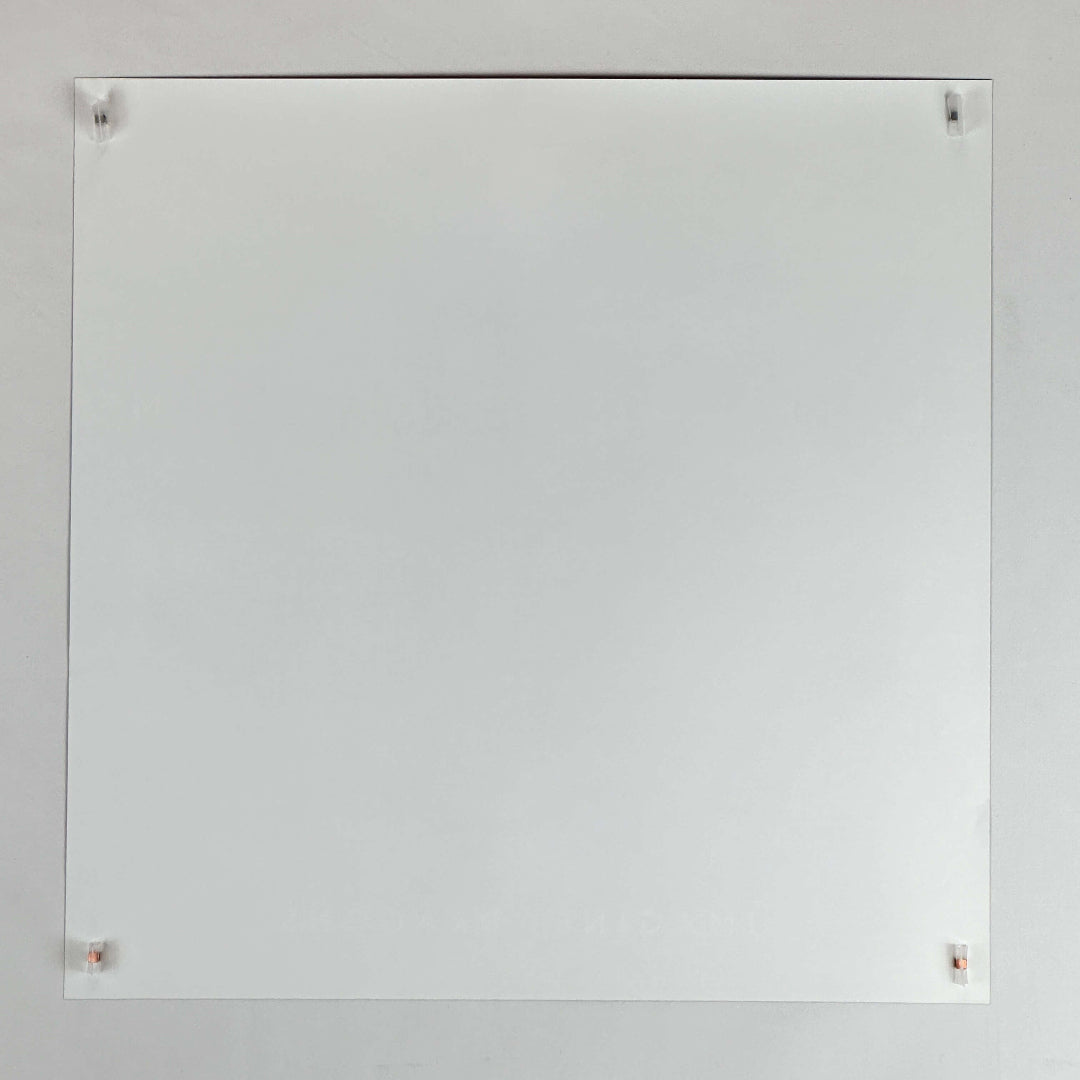 Backside of white, square poster showing no damage, and perfect edges.