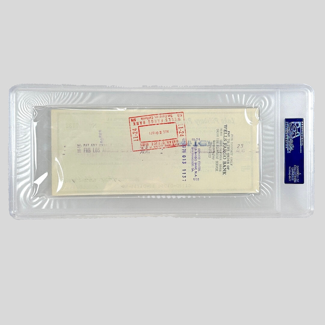 Vintage document inside a clear plastic holder with a blue label on a white background