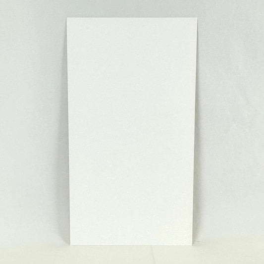 Backside of art print showing blank white paper with no damage.